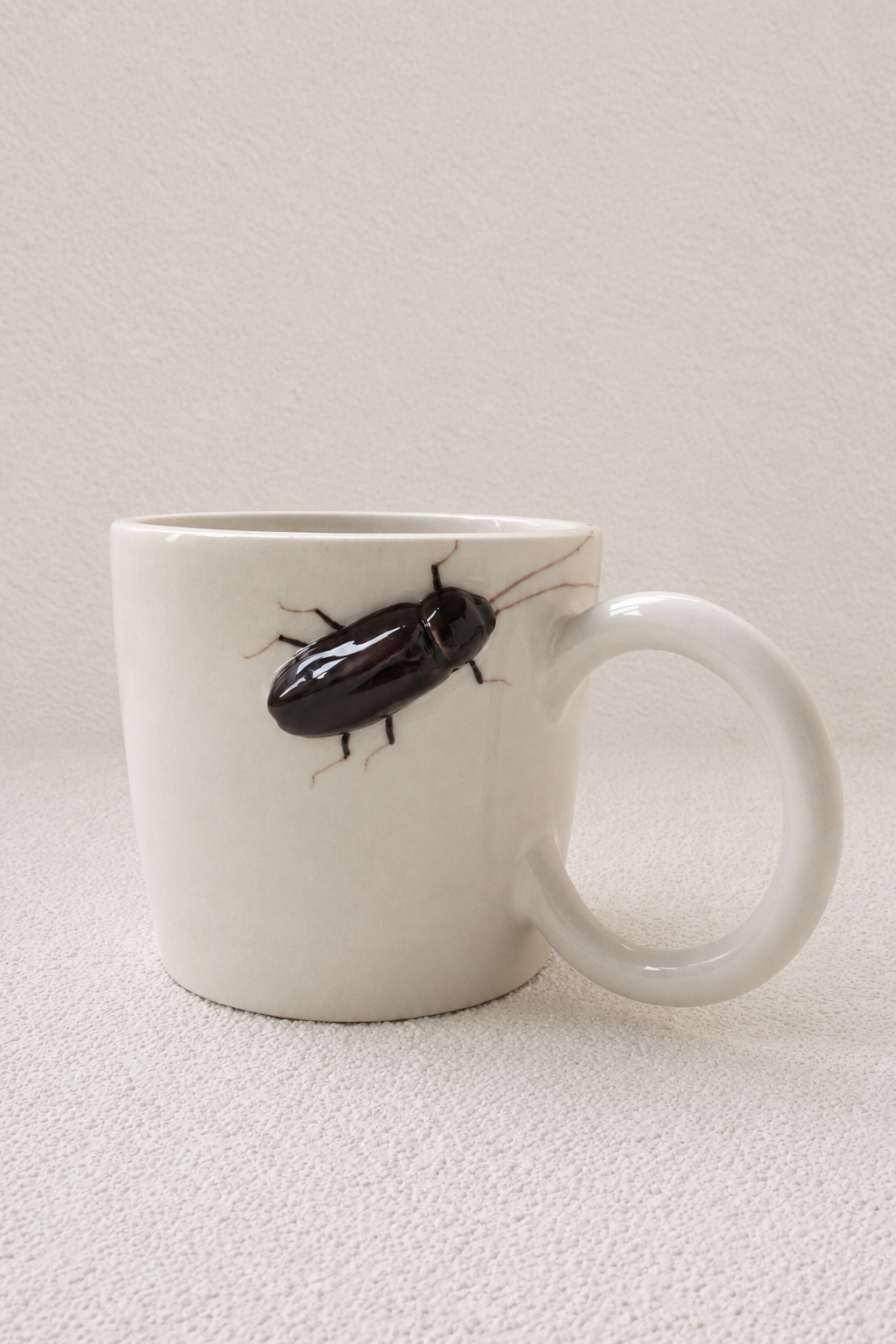 Handmade Ceramic Mug with a Raised 3D Cockroach